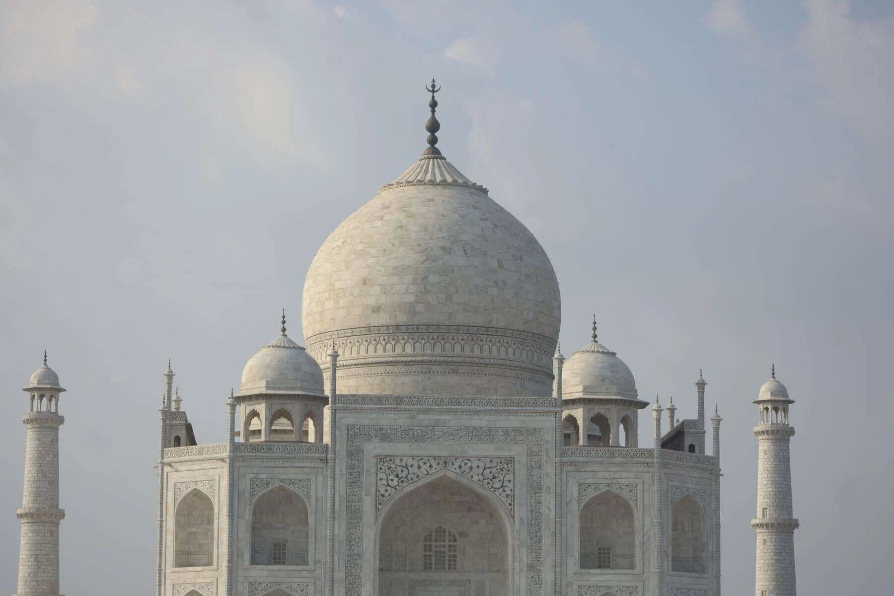 White marble dome of the Taj Mahal in Agra, India