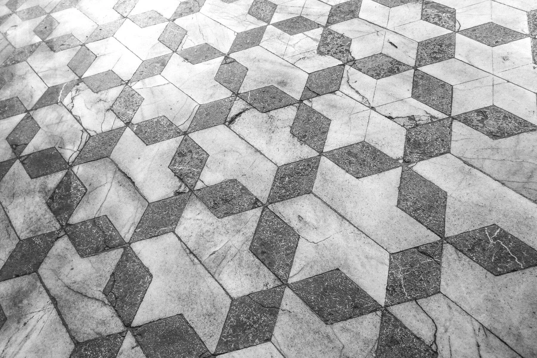 Marble tiles forming a star pattern