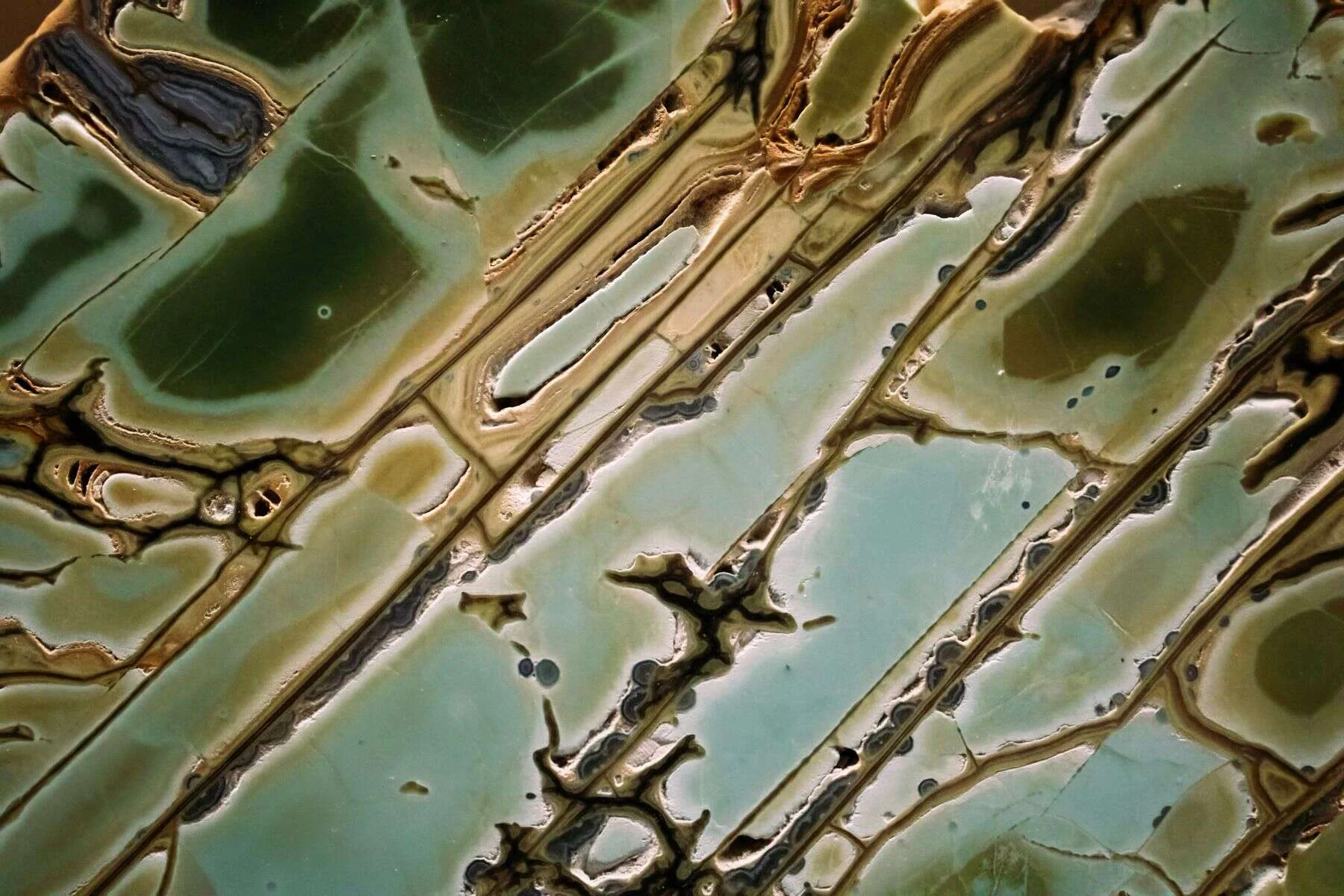 Green translucent onyx stone with dark patches