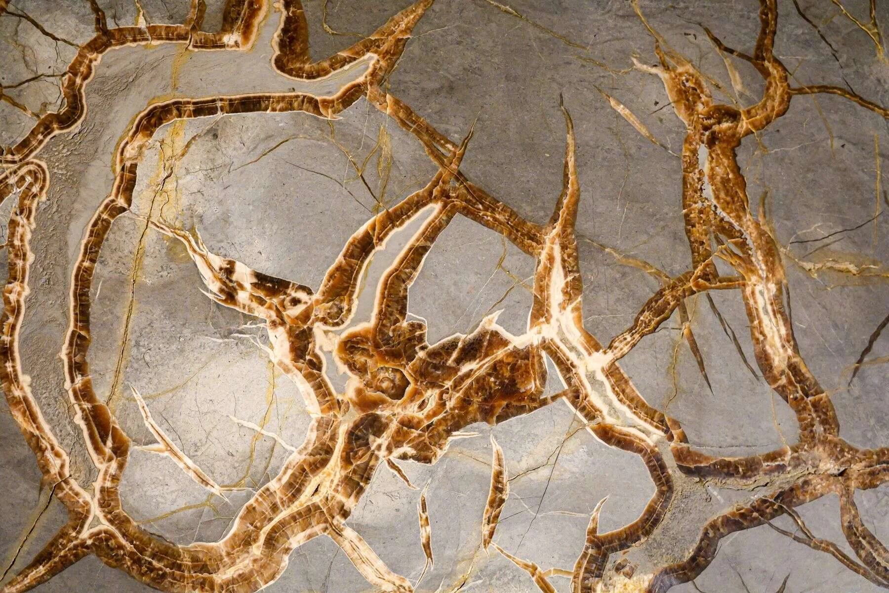 Natural stone slab with gold veining