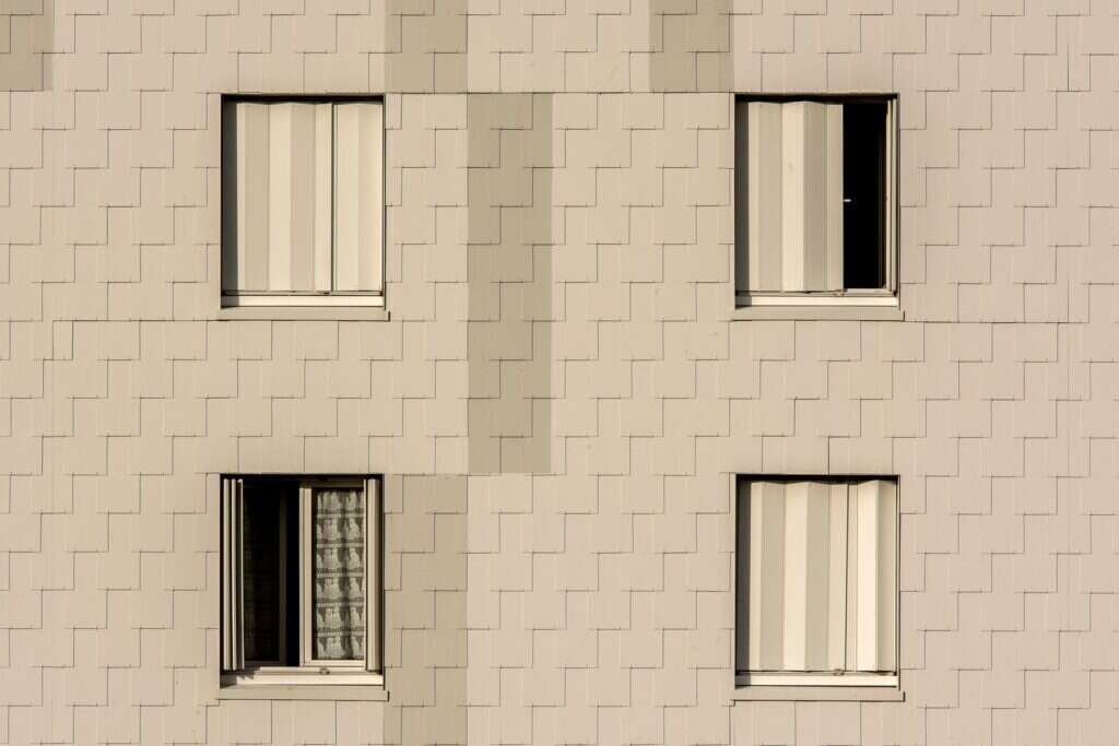 Apartment building with stone cladding panels