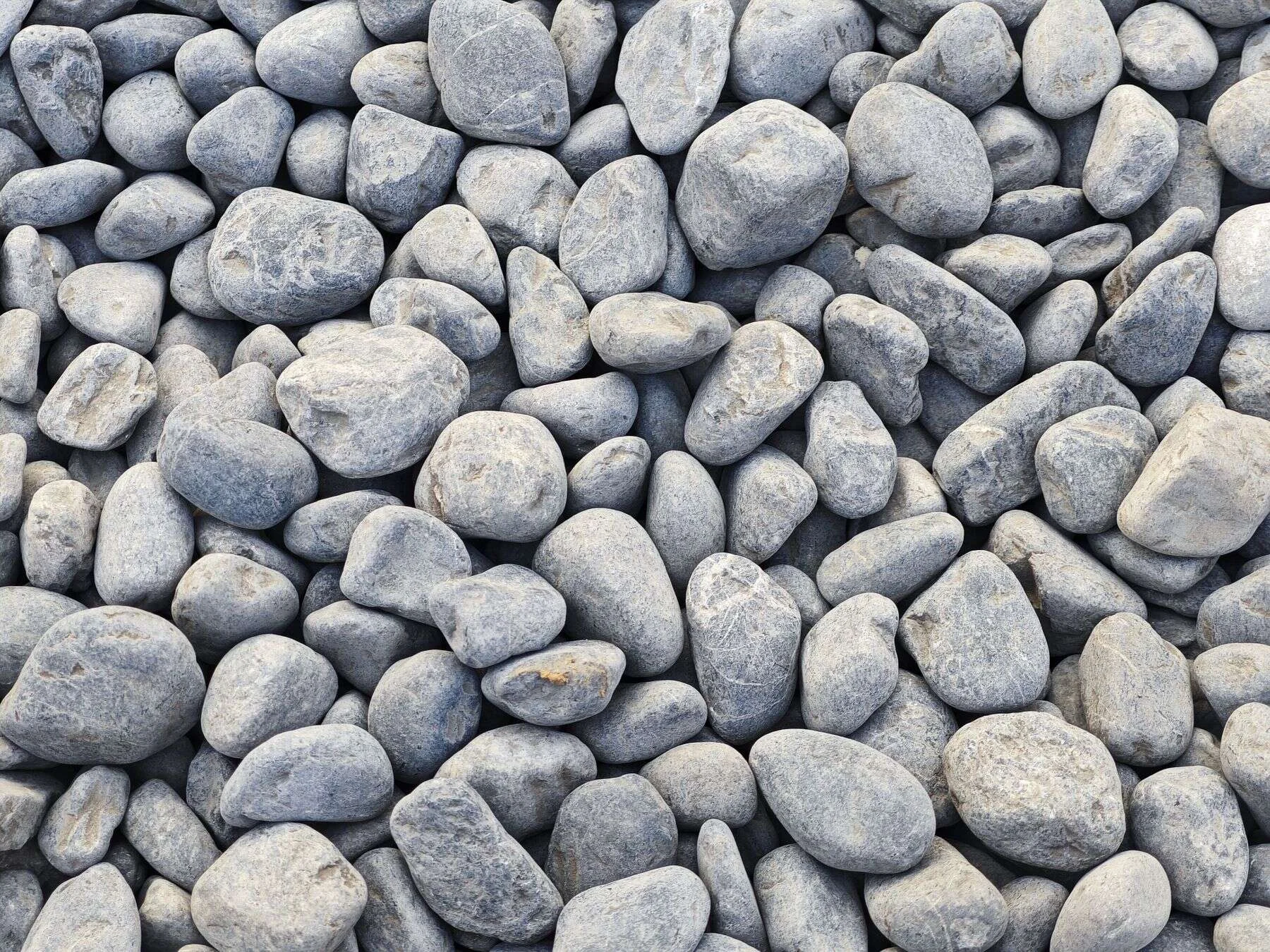 Smooth grey pebbles surface