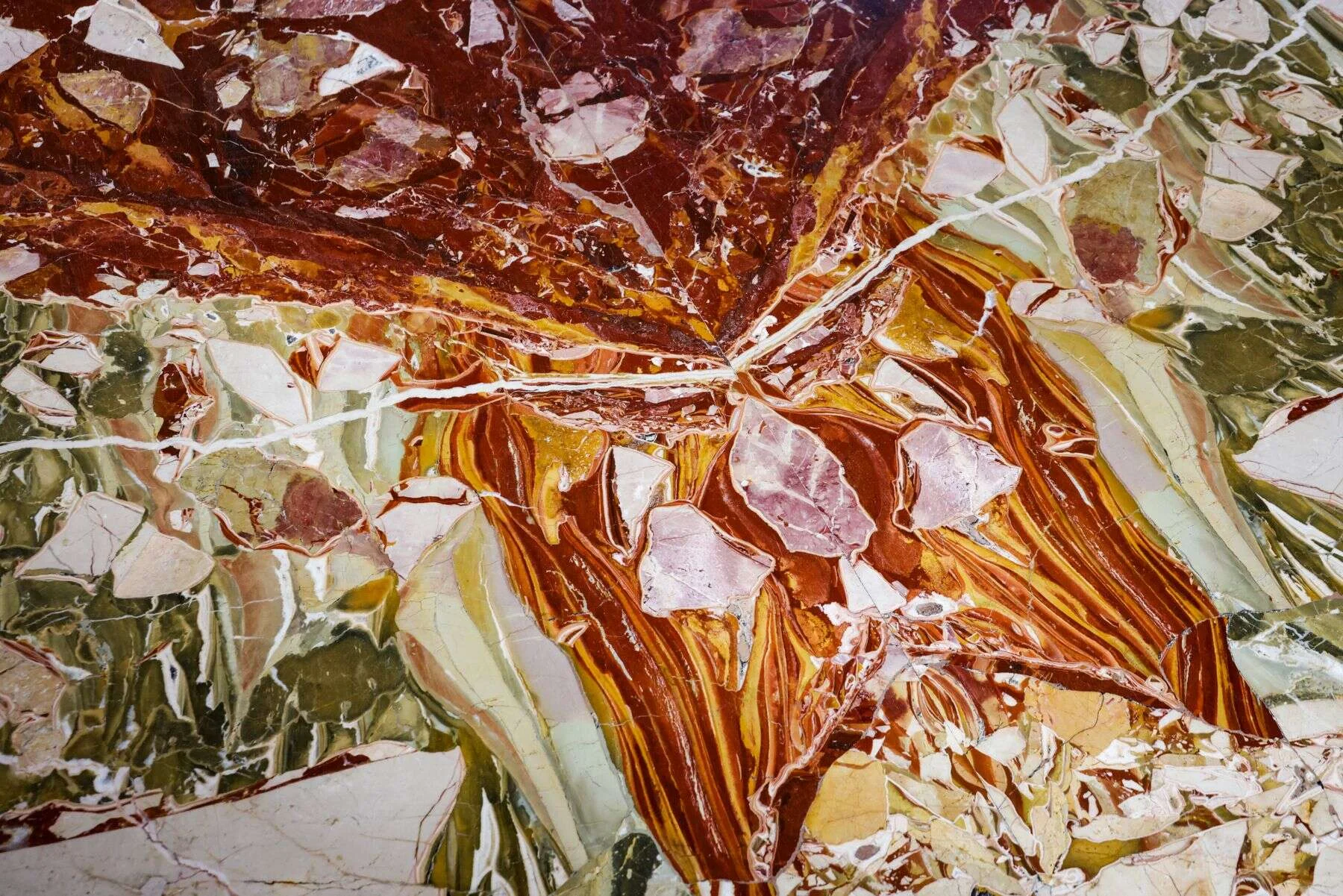 Vibrant multicolour marble slab with red and green