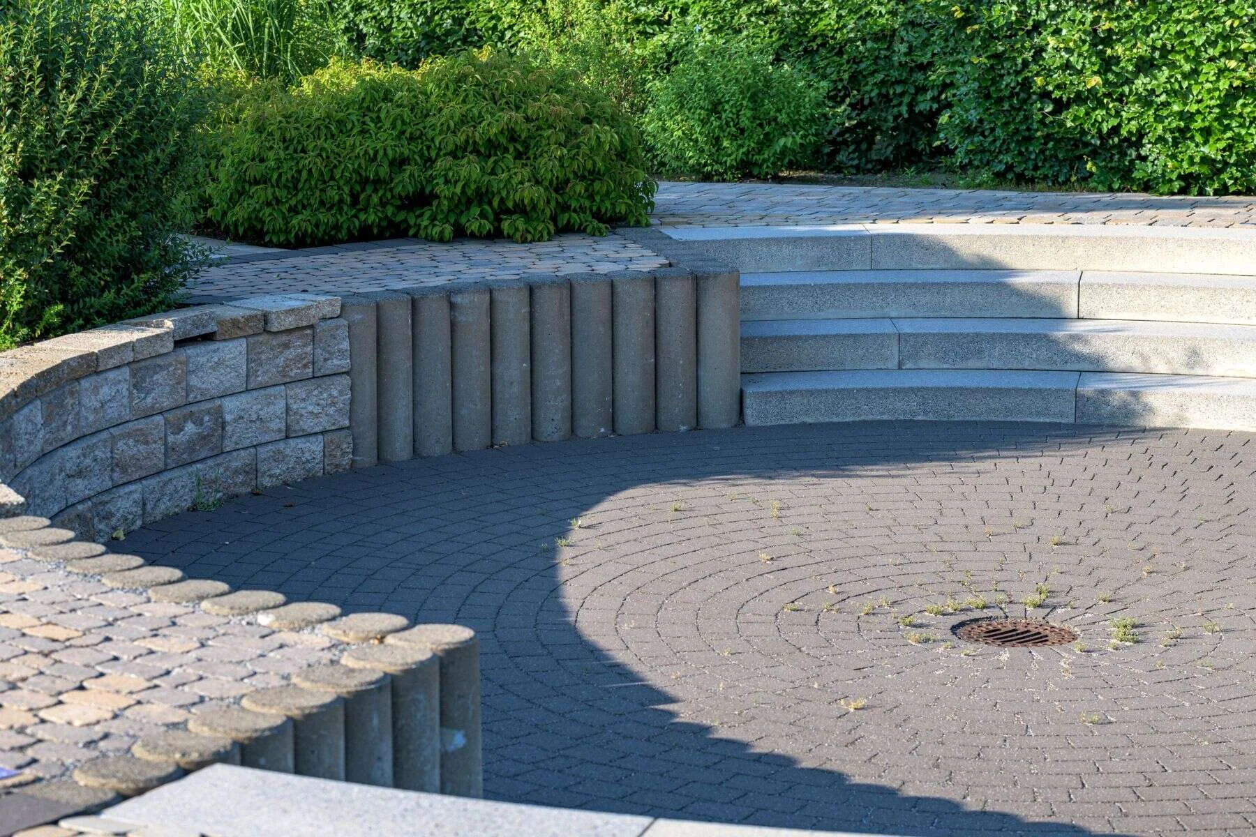 Circular stone patio with stepped seating