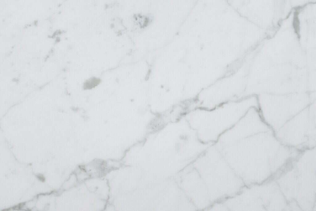 White marble surface with soft grey veining