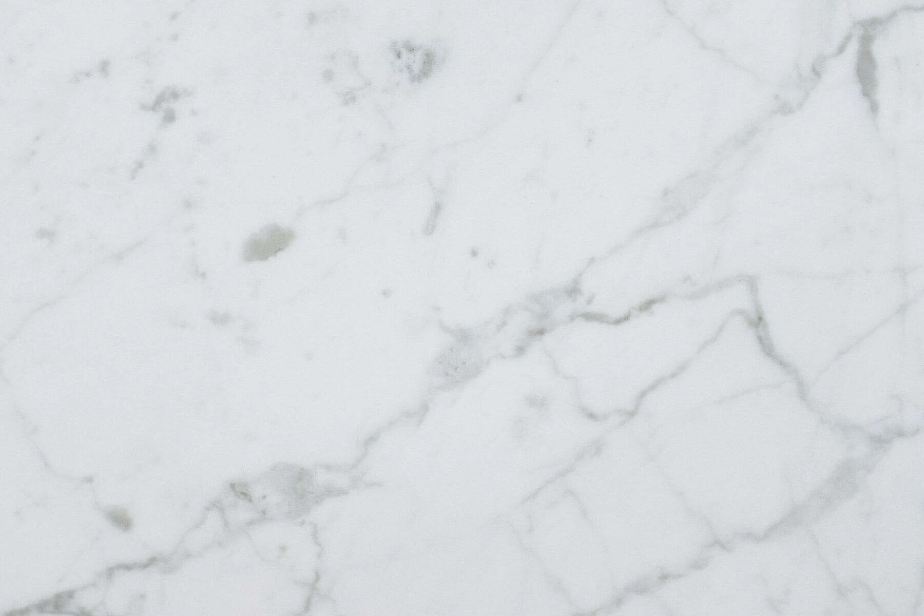 White marble surface with soft grey veining