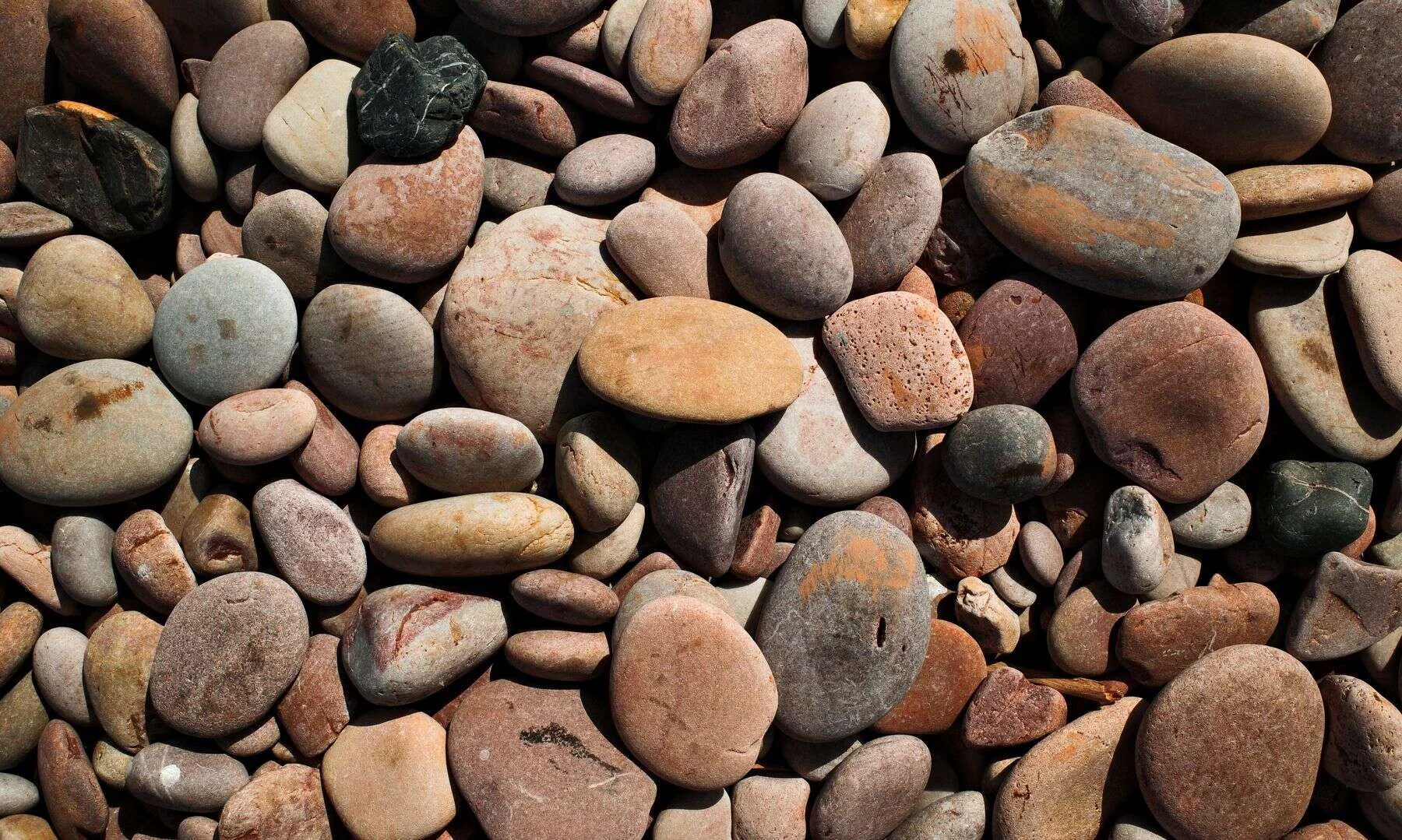 Colourful smooth pebbles