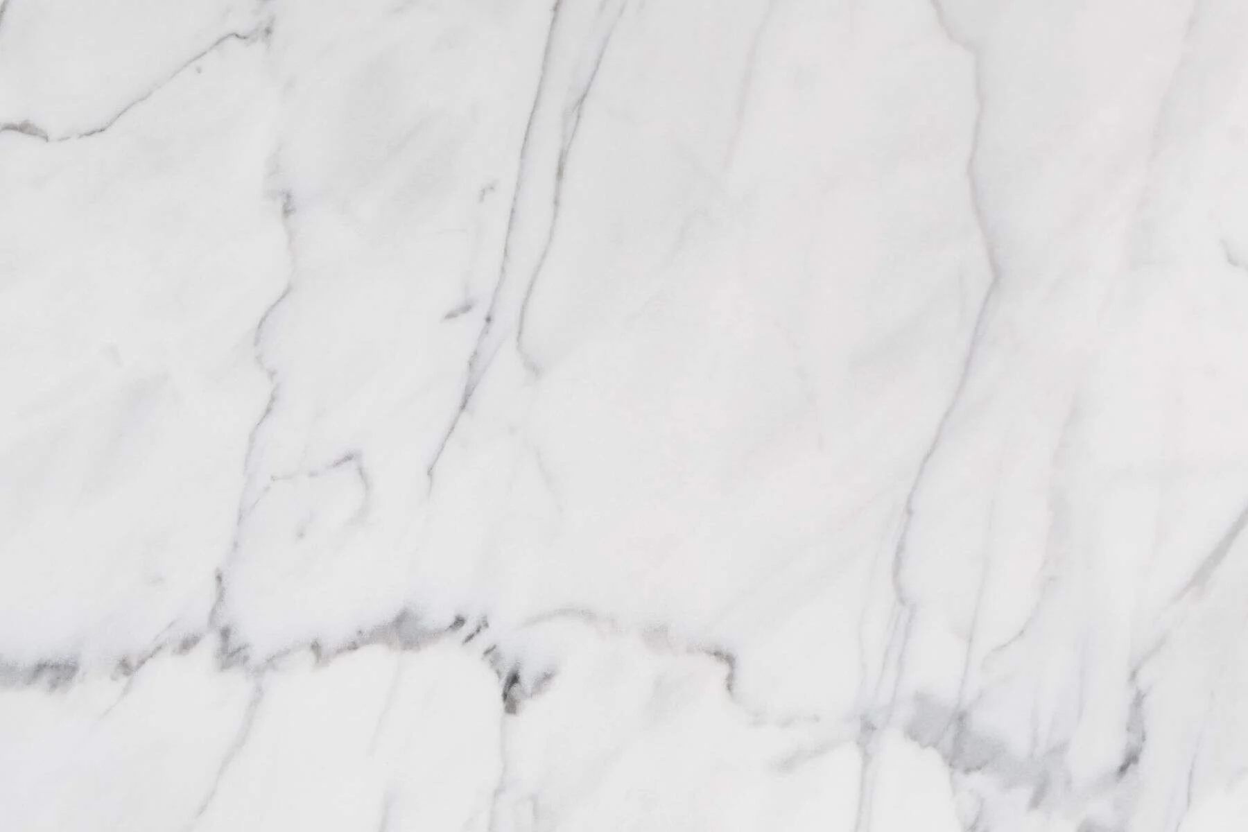 Polished white marble with delicate grey veins