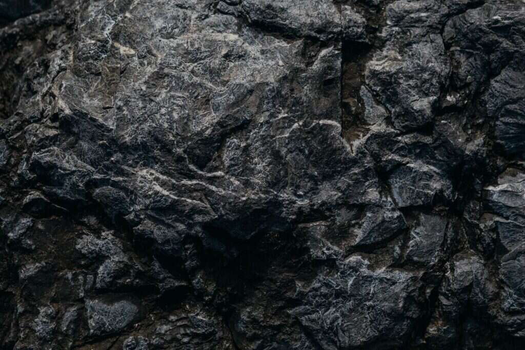 Dark grey rock surface close-up