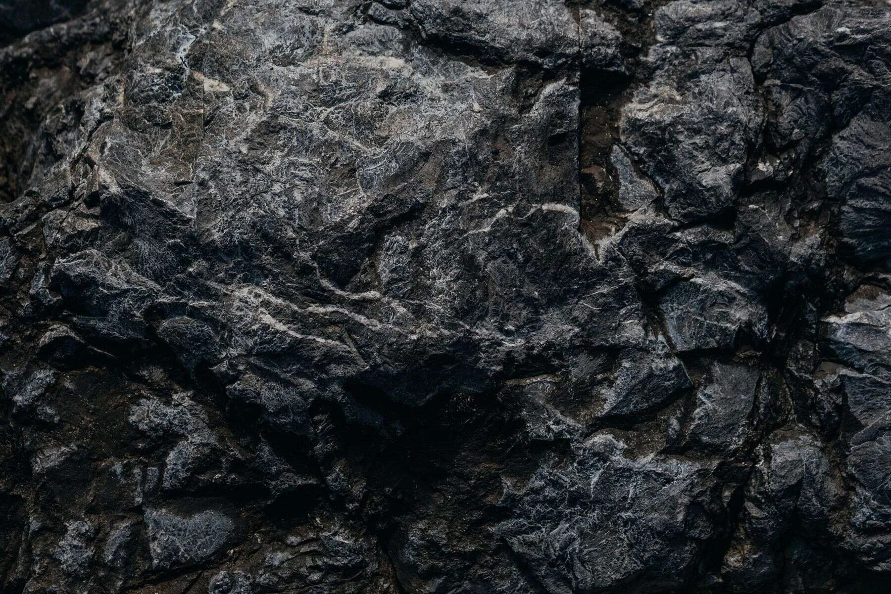 Dark grey rock surface close-up