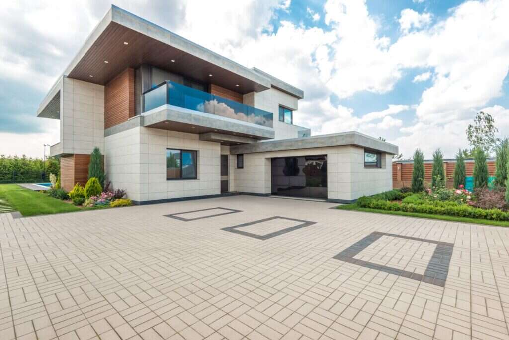Modern house with a stone paved driveway
