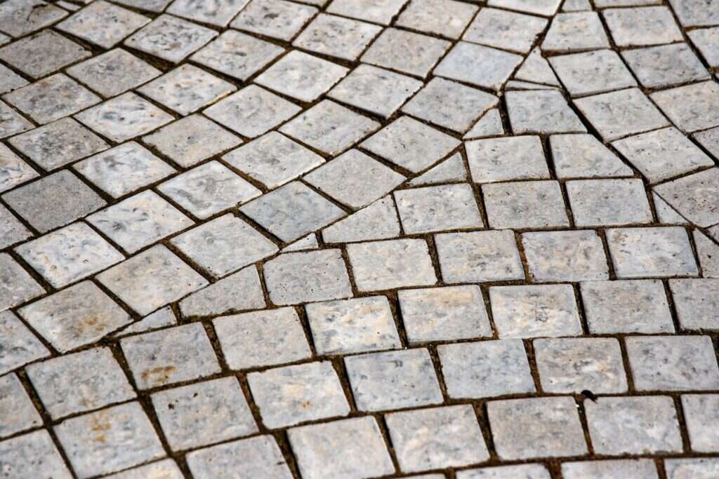 Granite setts laid in a curved paving pattern