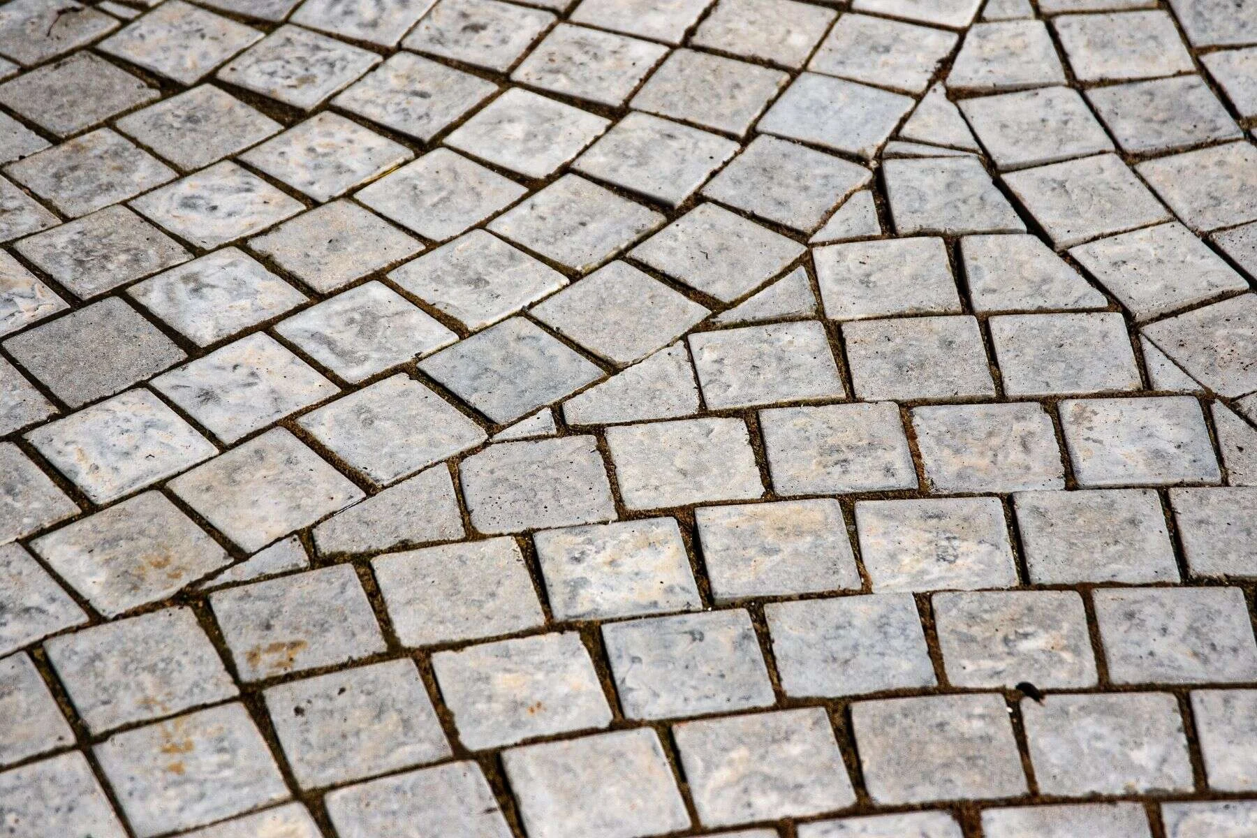 Granite setts laid in a curved paving pattern